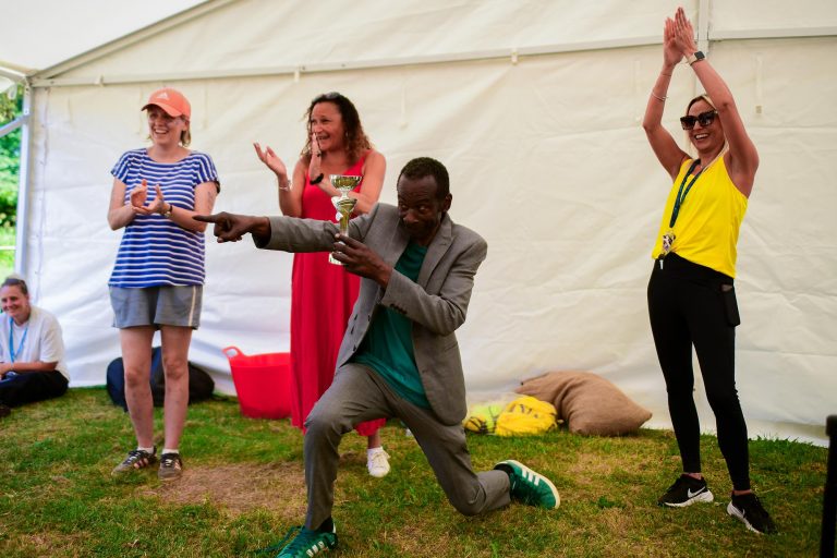 A teacher award a sports prize